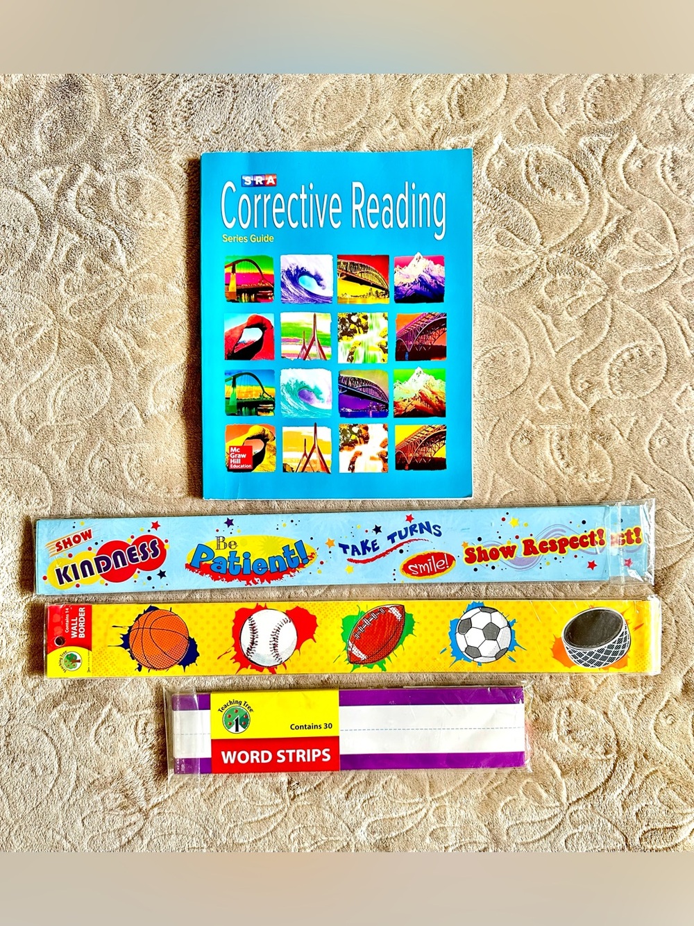 CORRECTIVE READING SERIES GUIDE BOOK BY MC GRAW HILL, WALL BORDER & WORD STRIPS
